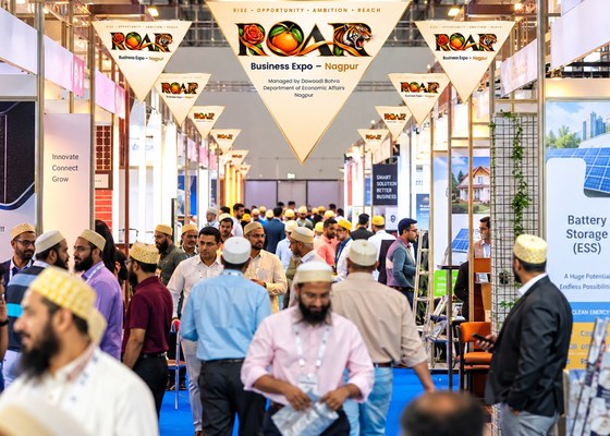 Business conversations along an expo aisle